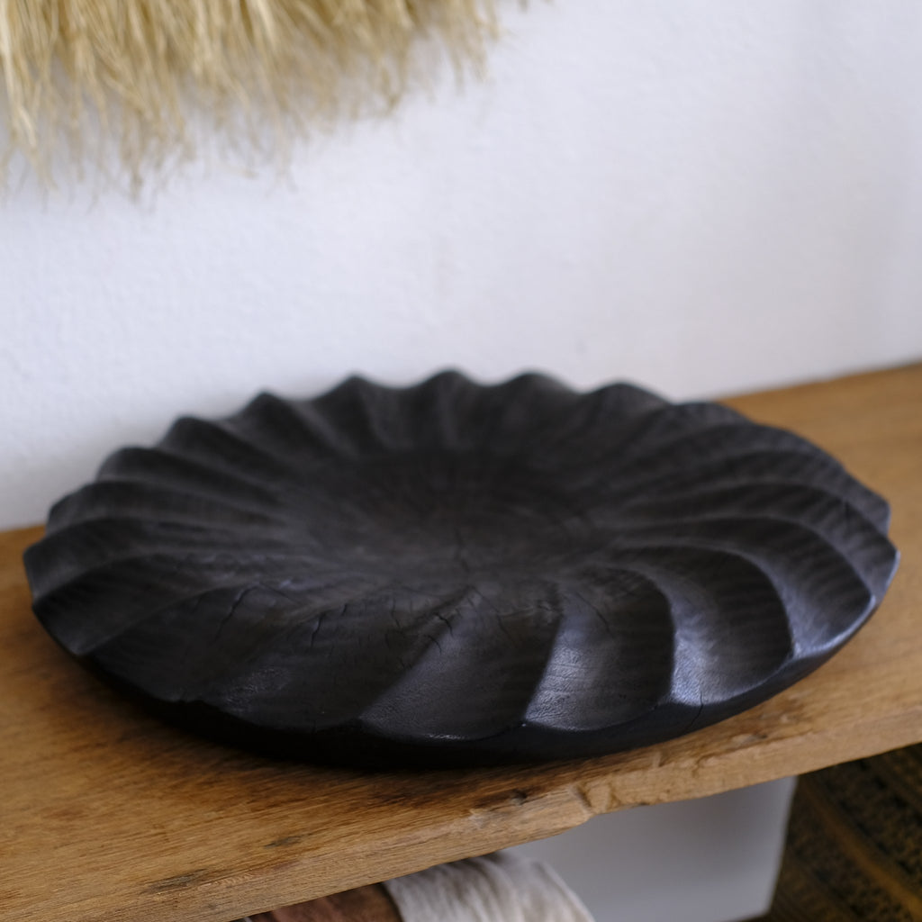 Hand carved wooden vessel, charred suar wood