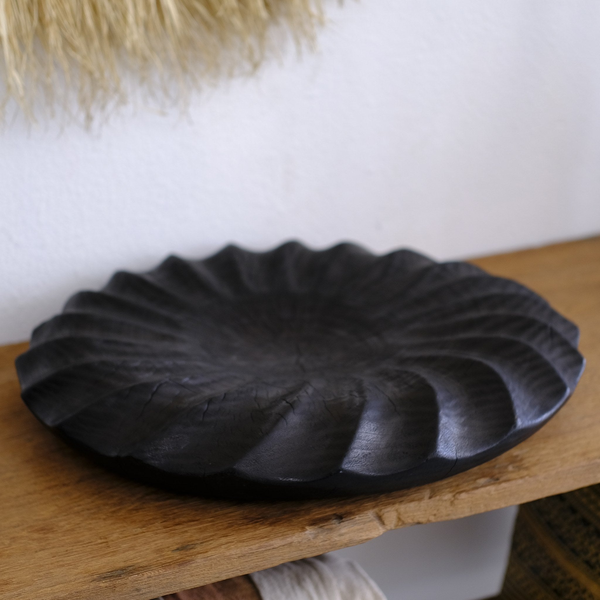 Hand carved wooden vessel, charred suar wood
