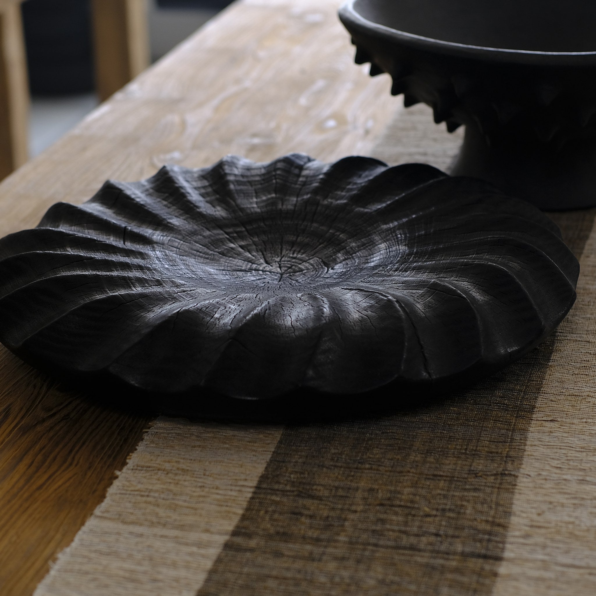Hand carved wooden vessel, charred suar wood