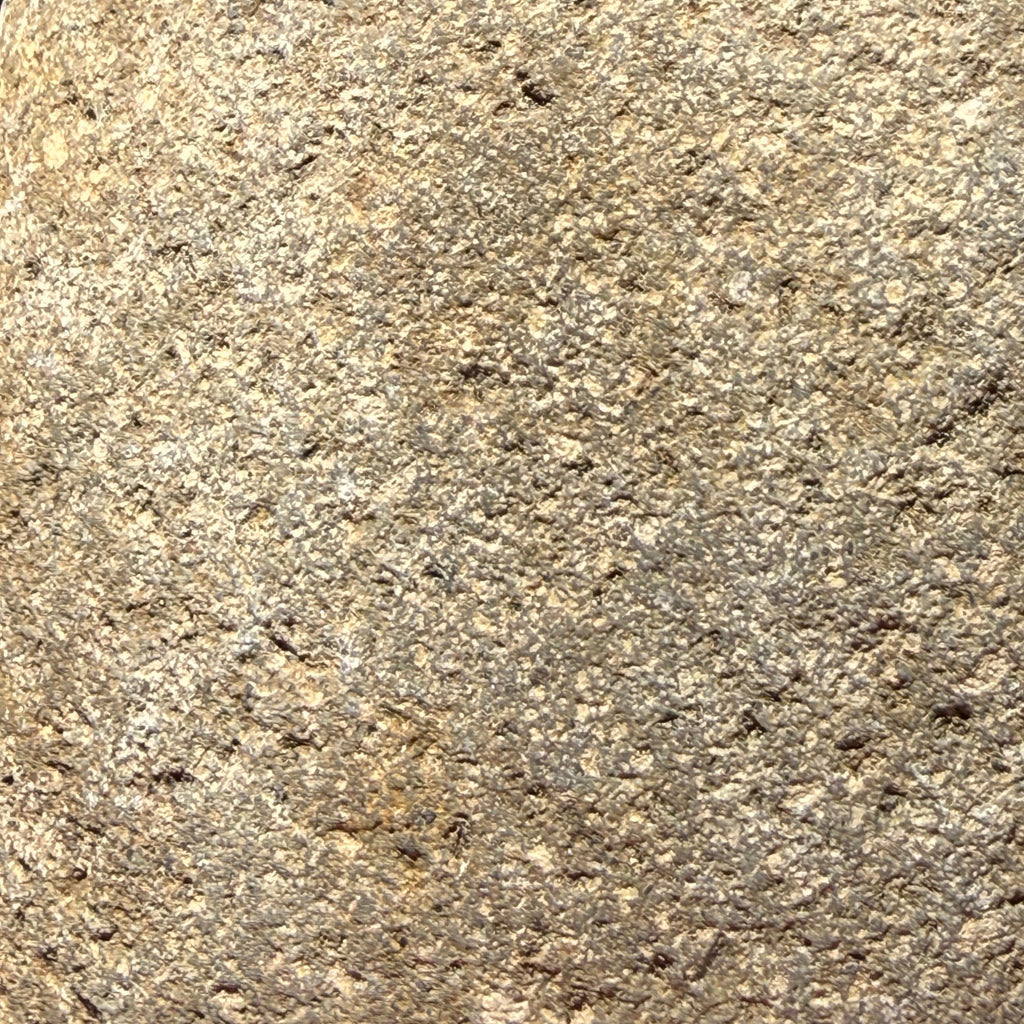 River stone soap dispenser with steel pump texture detail