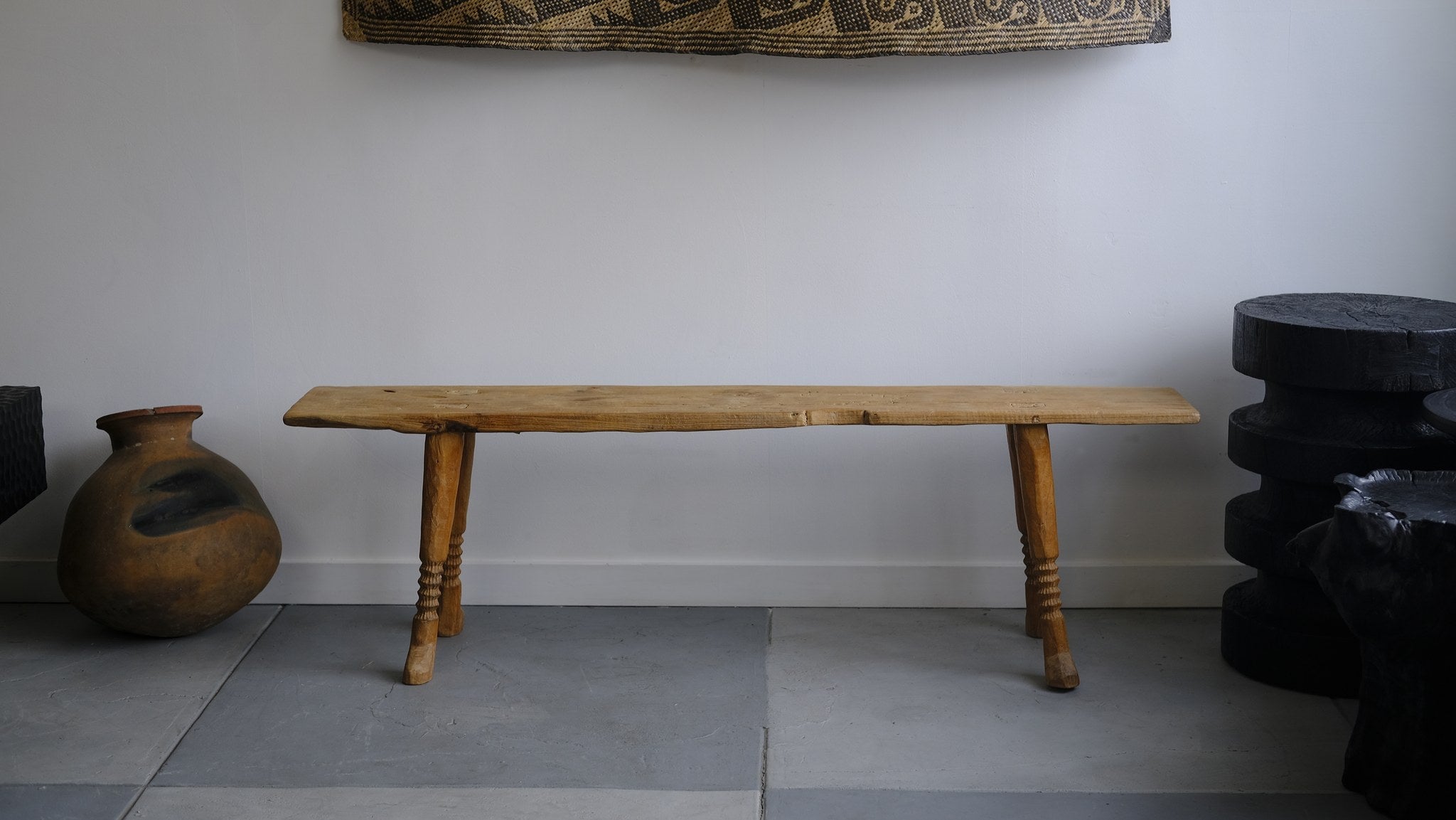 Footed bench with carved detail, aged teak wood (A) - Hand and Ember